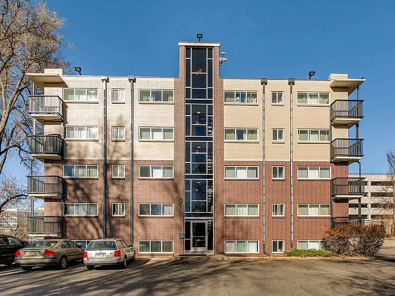 Our Apartment Building Spacious Parking Lot at Scandia Apartments in Englewood, Colorado