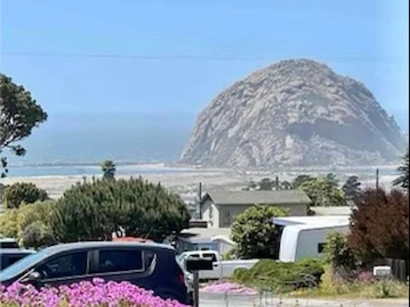 Beautiful views galore! As seen from the front yard and the indoor living area.