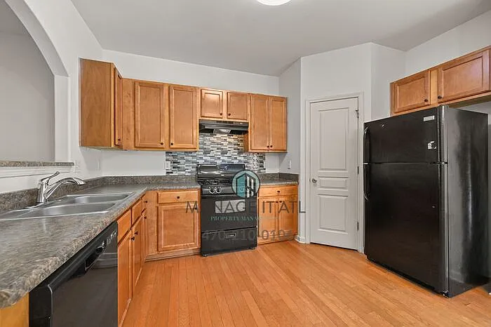 6185 Elmshorn Way — Photo 12