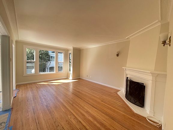 Living room with fire place measures 13' x 18'