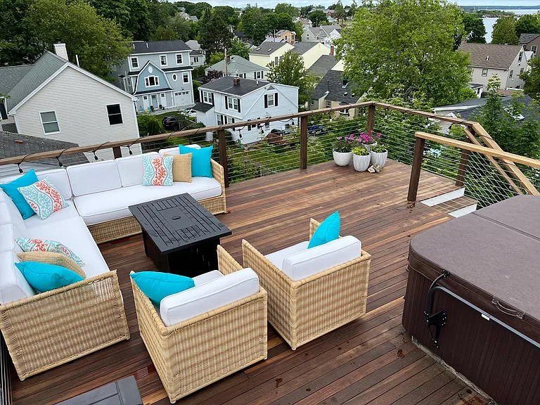 Roof top deck with views of the Portland shipping channel.