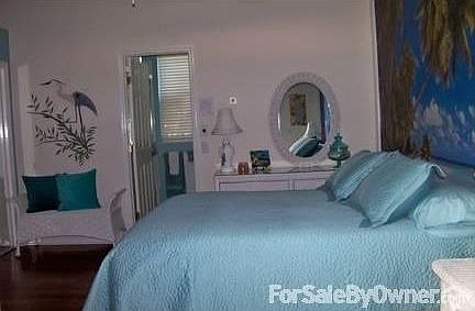 Seperated Mother In-Law Suite : Brazilian cherry floor, plantation shudder, beachscene mural, design