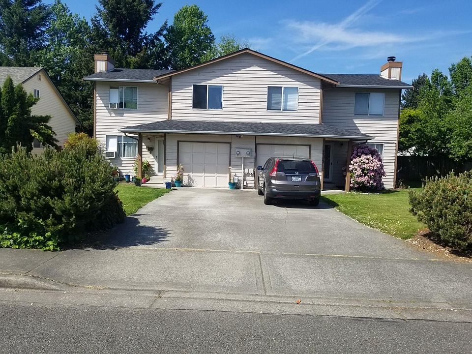 Front of house* *Bushes have been recently removed