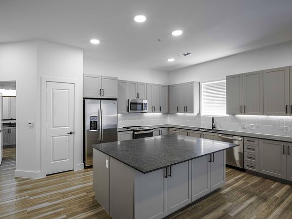 Stainless steel ENERGY STAR appliance packages including front-control ranges hidden-control dishwashers.