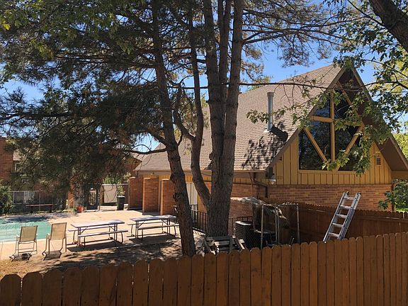 the swimming pool and the club house