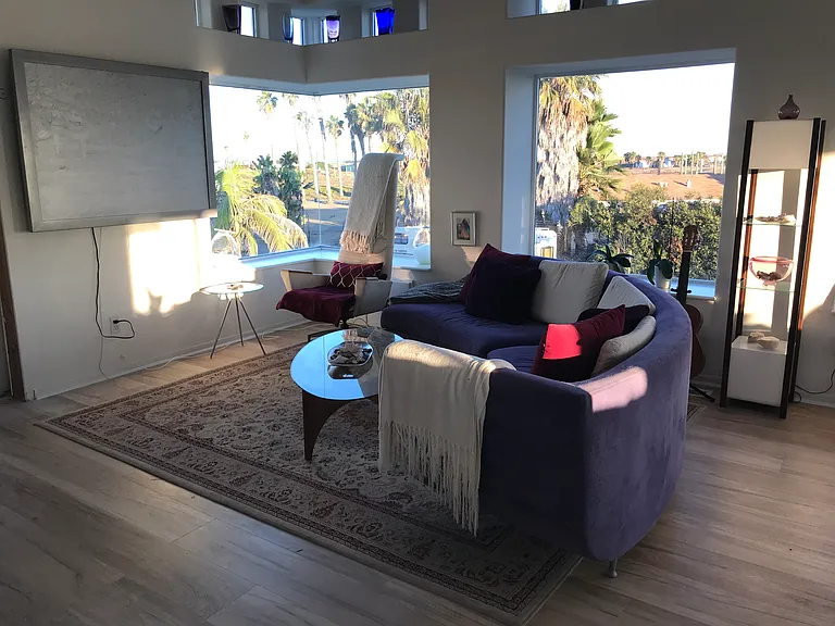 Upstairs is bright and sunny. This is an upside-down floor plan, with the living room and kitchen upstairs!
