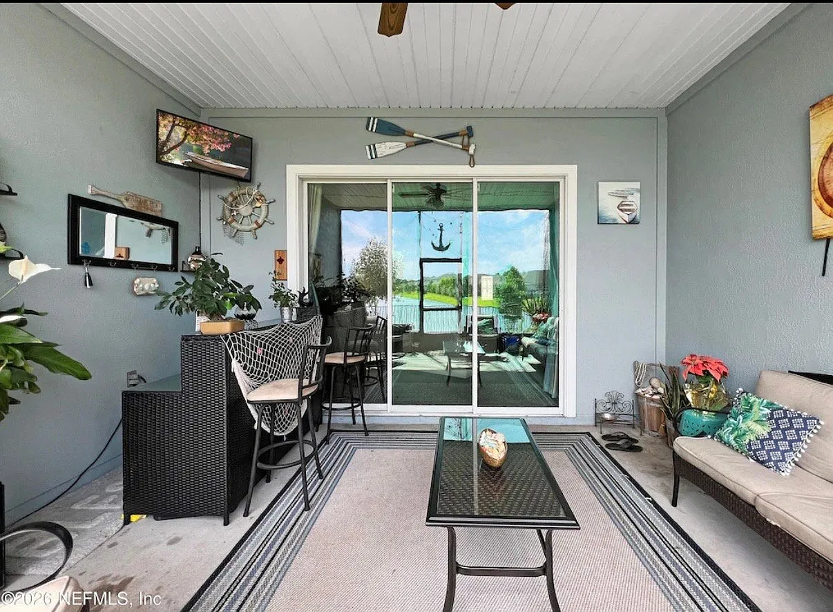 Five Bedrooms with four Baths, three car garage, a lake and a Lanai ready to he called home — Photo 3