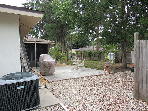 6' completely fence back yard with patio and garden area