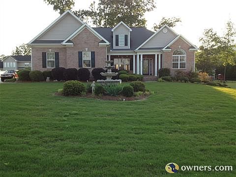 customized landscaping with electrictrical outlet out front