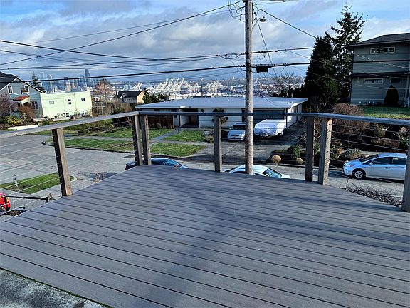Enjoy spending time on this spacious deck overlooking downtown Seattle & beyond....