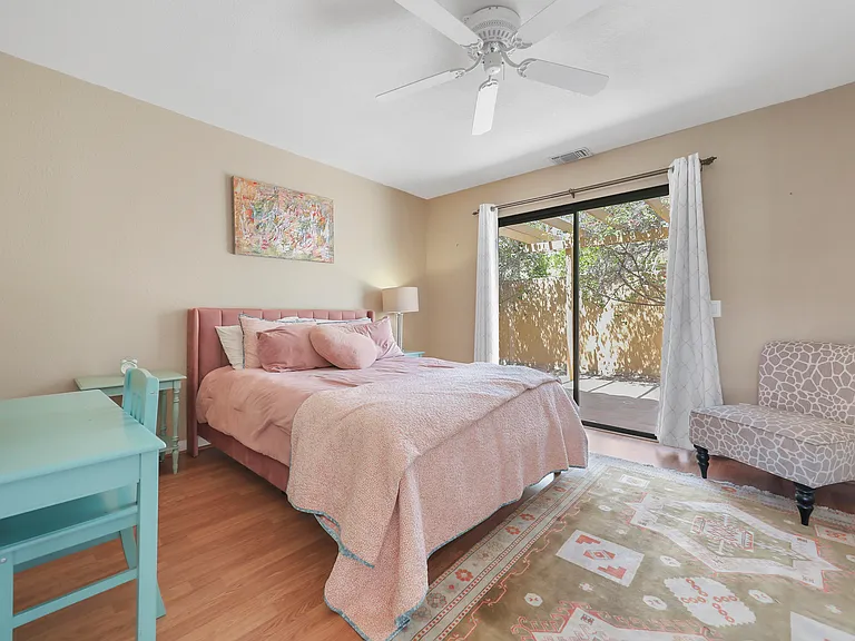 Bedroom with slider door to patio