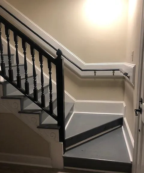 Stairs next to front door leads to bedrooms.