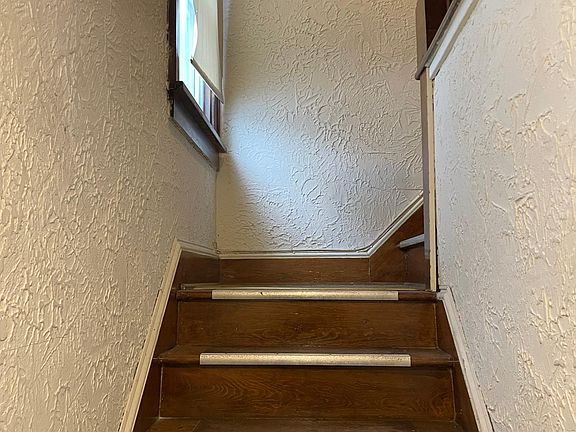 Stairway from entrance to upstairs apartment
