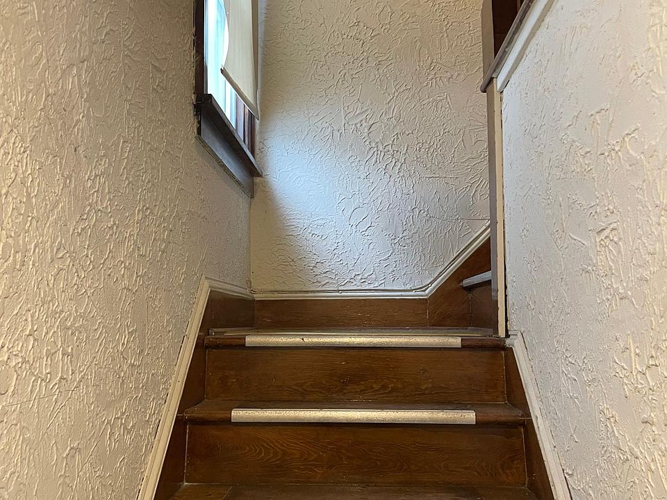 Stairway from entrance to upstairs apartment