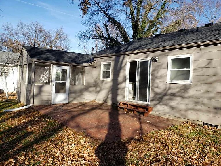 Sliding doors off the dining room or from the screened porch create great access to large, stained deck. Plenty of room for eating and seating arrangements....and a BBQ grill.