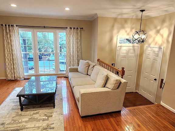 Sunny living space, large entryway HW floors!