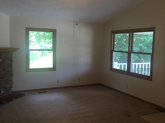 living room with vaulted ceilings