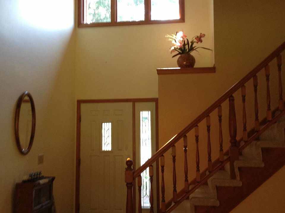 Front entrance with staircase to 1 bedroom , and loft