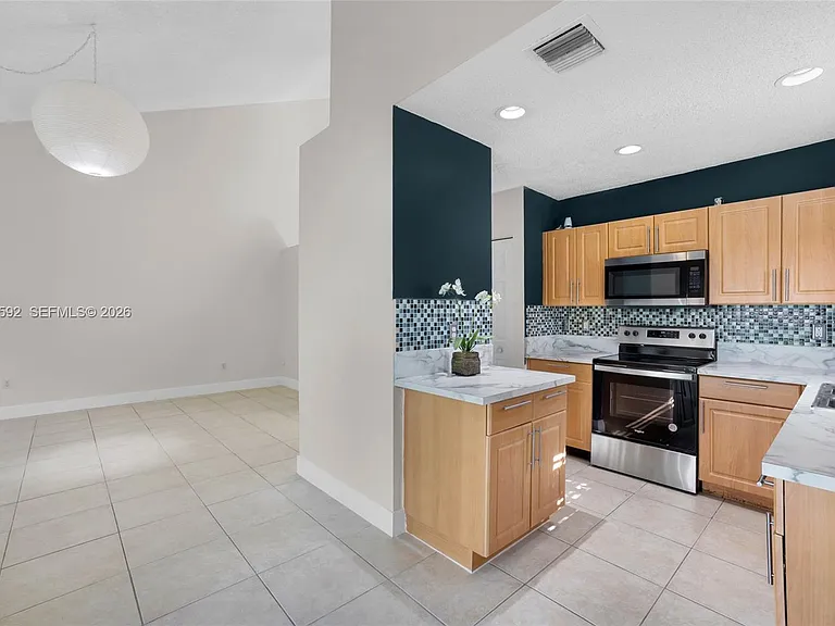 9820 NW 24th Ct — Photo 5