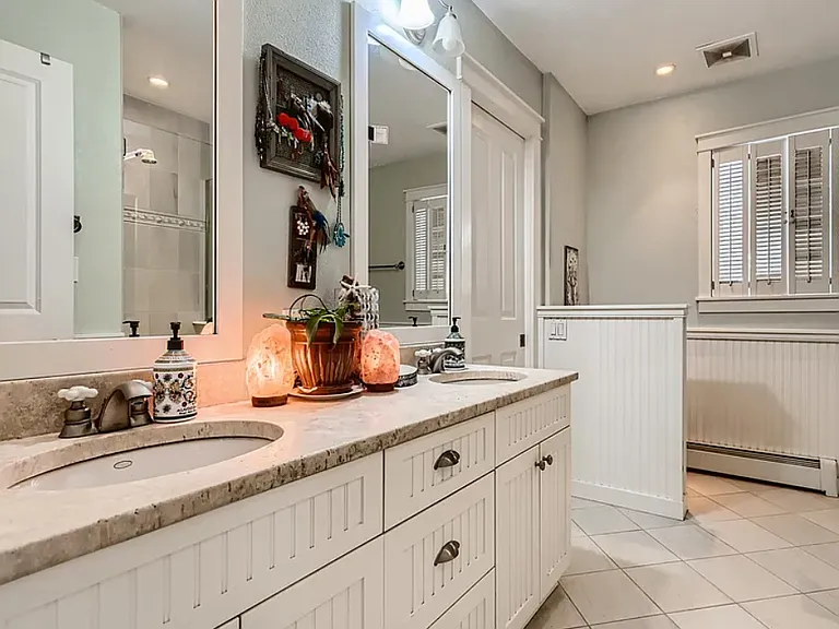 Large bathroom, dual sinks, tub and shower, newly updated