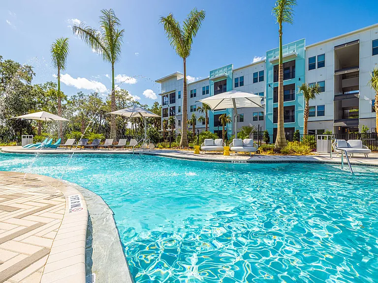 Relaxing Saltwater Pool with Wi-Fi, Sun Shelves, Cabanas & Grill Areas