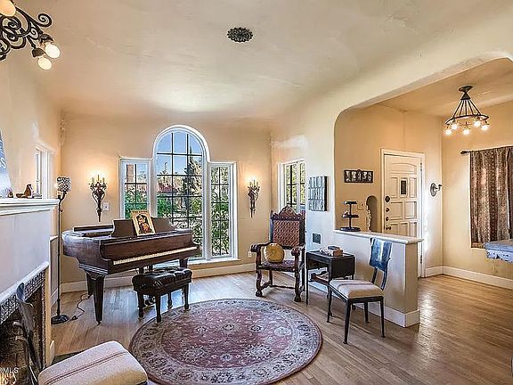 Front parlor includes baby grand player piano