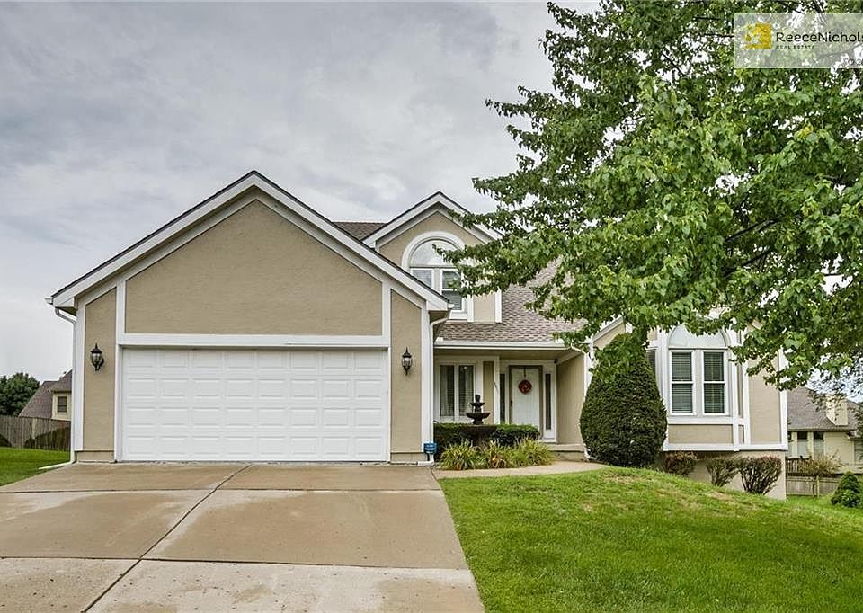 Gorgeous 1 1/2 story home with 2 car garage.