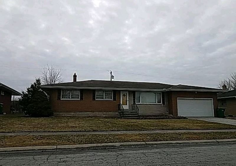1st image of 1309 W 56th Ave