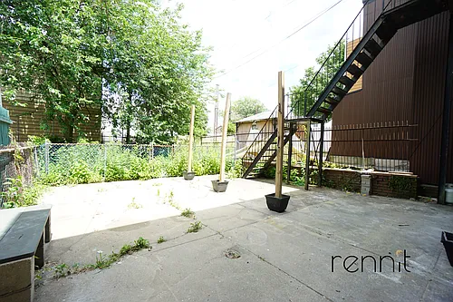 60-85 54th St #PRIVATE-BACKYARD Photo 1