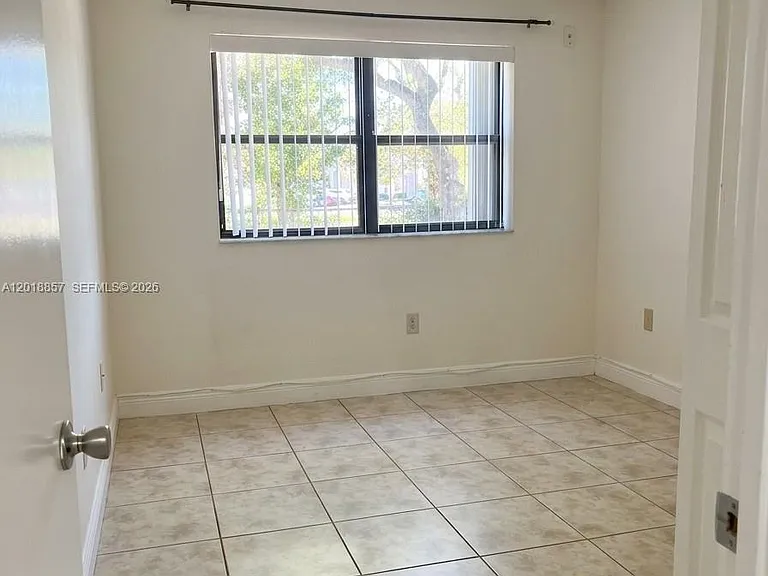 7115 NW 179th St #106 — Photo 4