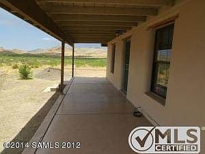 View of west-facing, covered back patio