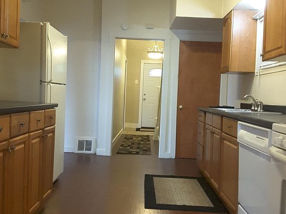 Kitchen and view to front door.