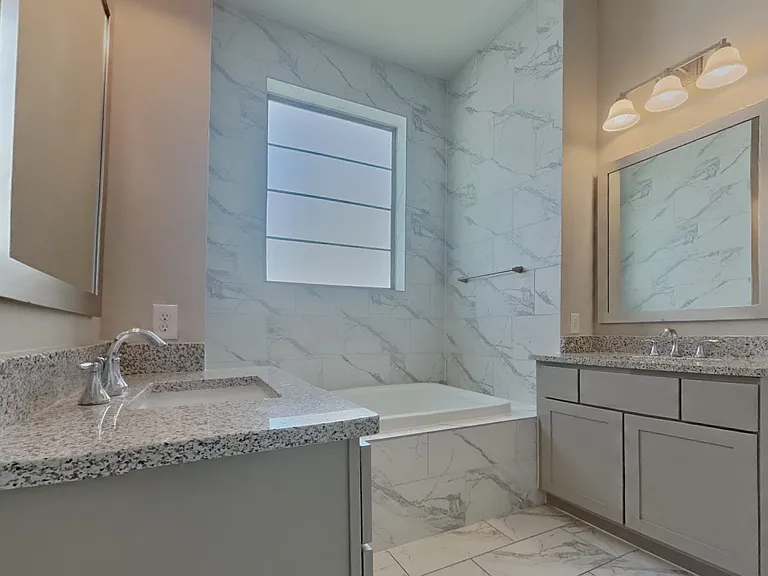 Modern bathroom with marble wa