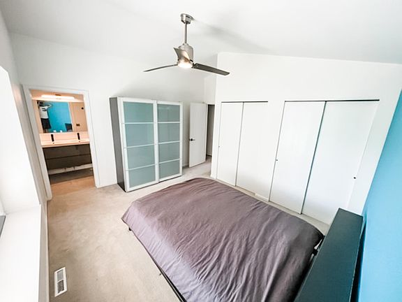 Master bedroom. No furniture included. Right/back wall behind bed is now painted white.