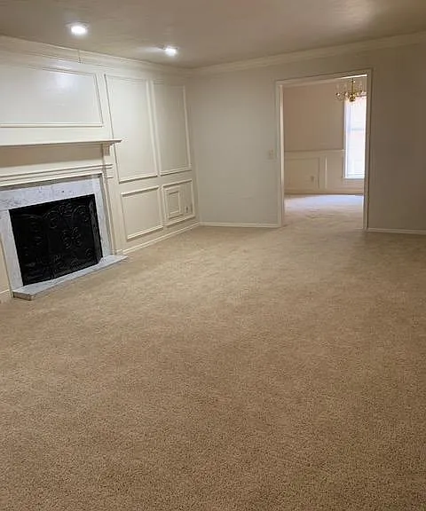 Formal Living Room With Marble Gas Fire Place