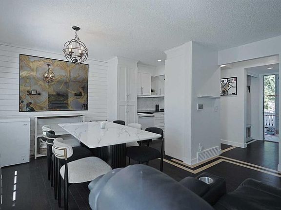 3rd image of 310 N Falconridge Cres NE #205