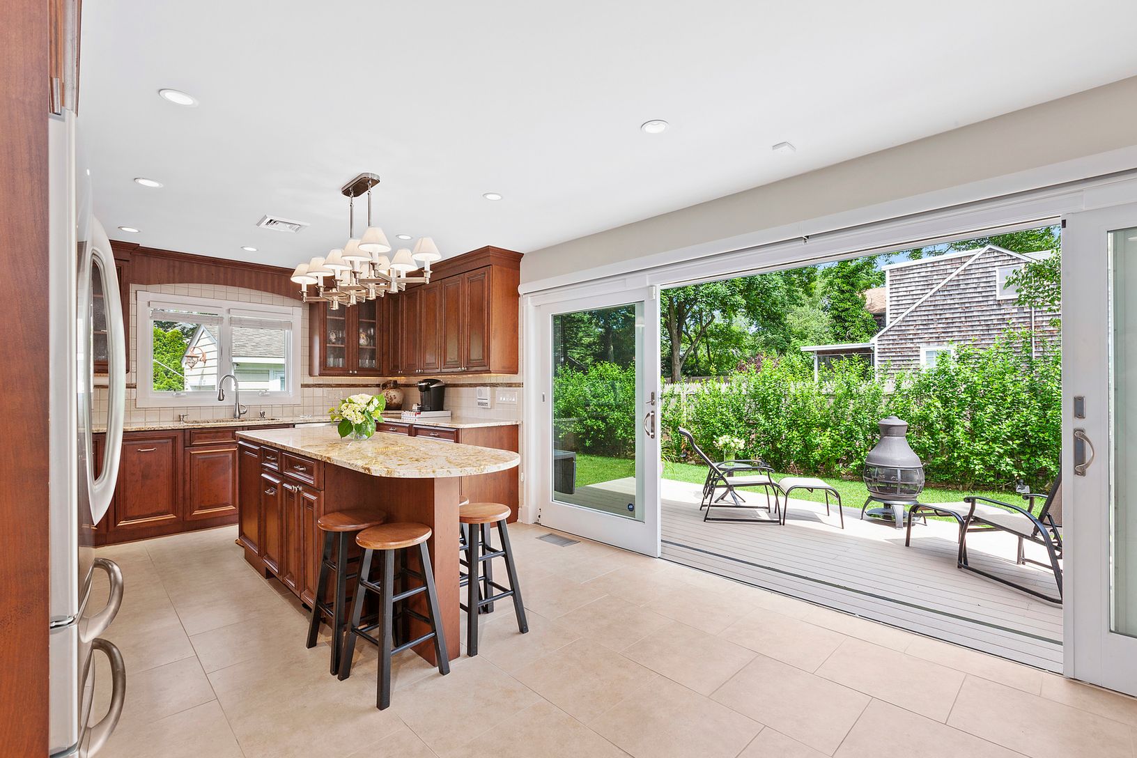  kitchen is open to dining/living areas as well as rear deck