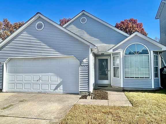 Front of home. 2-car garage.