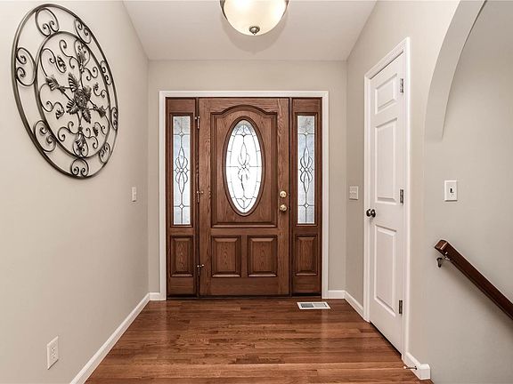 Wide foyer has wood floors!  No pets or smoking ever in this home!