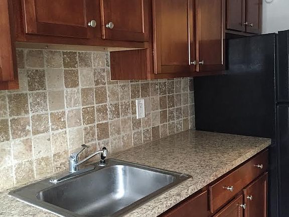 Custom Cabinetry And Backsplash