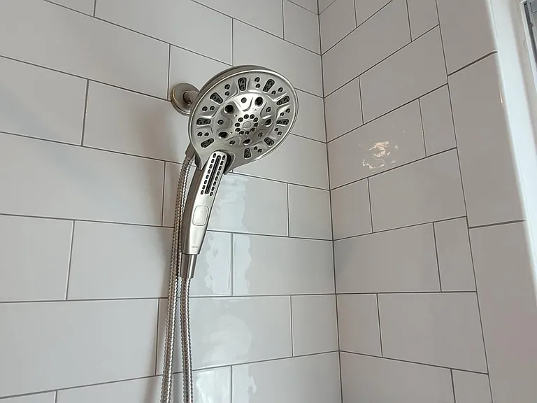 2 piece detachable, massaging shower head in brushed nickel