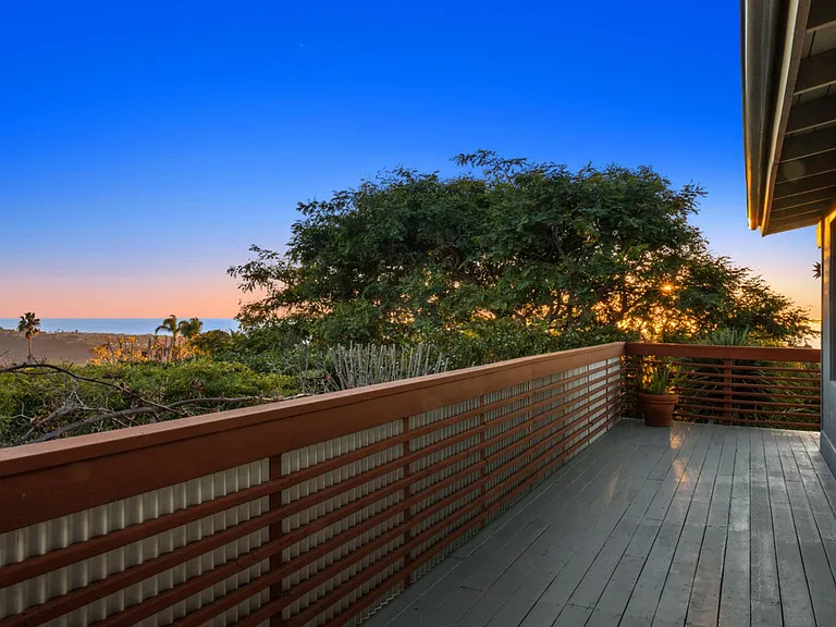 wrap around deck upper floor ocean and back country views