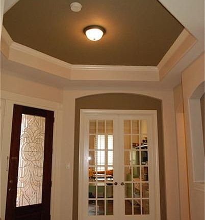 View of foyer and french door entry to study.