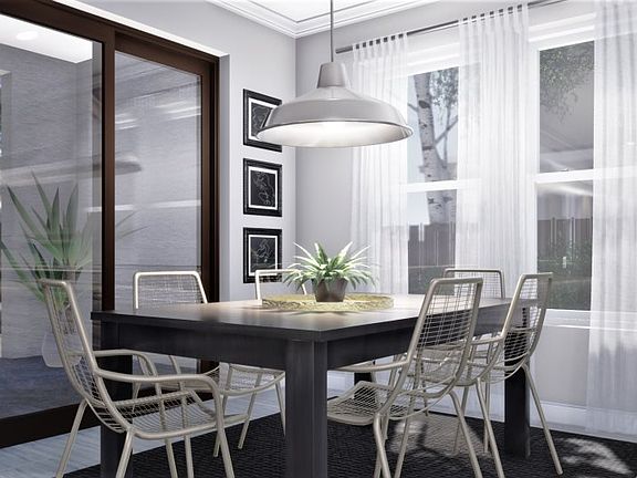 The sophisticated dining nook creates a lovely space for intimate meals, friendly brunches or elegan