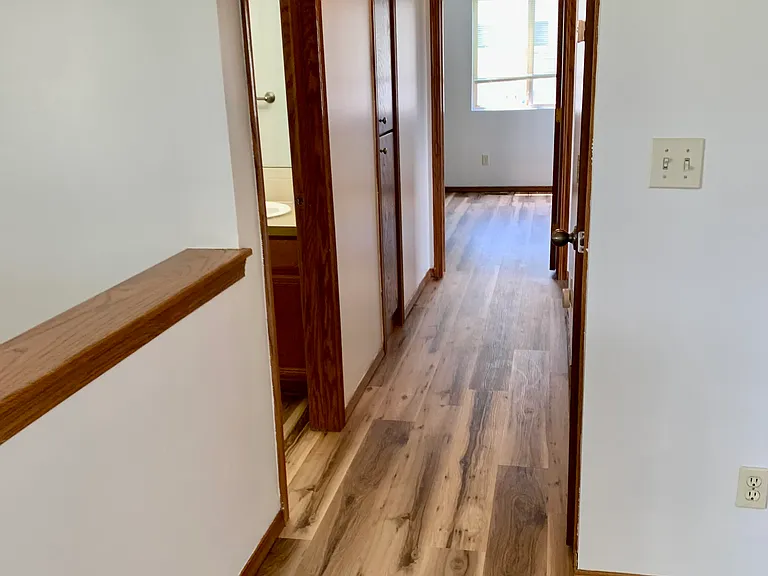 main level hallway towards the master bedroom