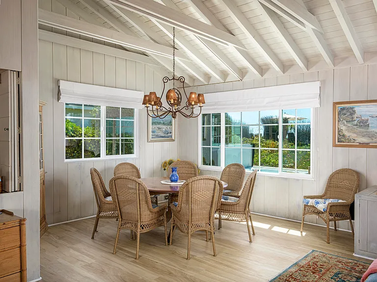 Dining room with large table and seating for up to 8.