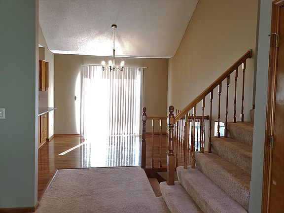 dining room with patio door to upper deck