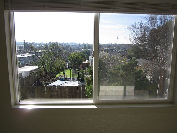 Dining room window with view of San Francisco Bay Area.