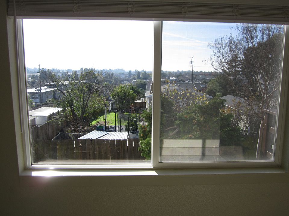 Dining room window with view of San Francisco Bay Area.