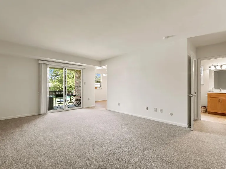Spacious Living Room- with sliding glass doors that lead to your private patio or balcony